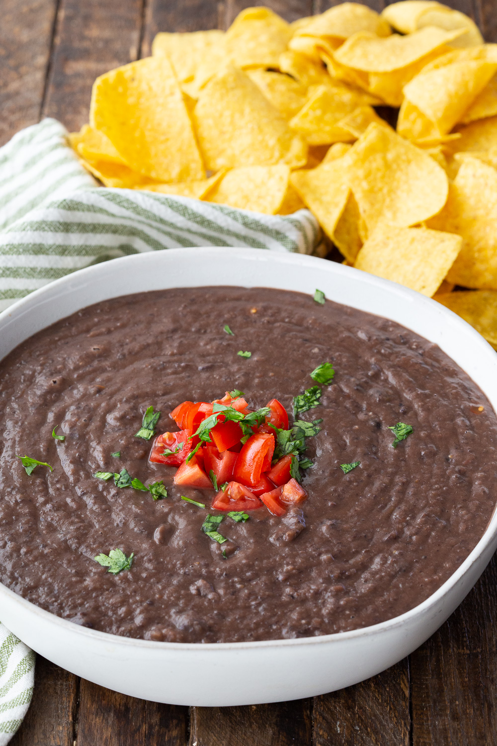Black beans, a delicious way to make them for tacos, burritos, chip dip, and more. 