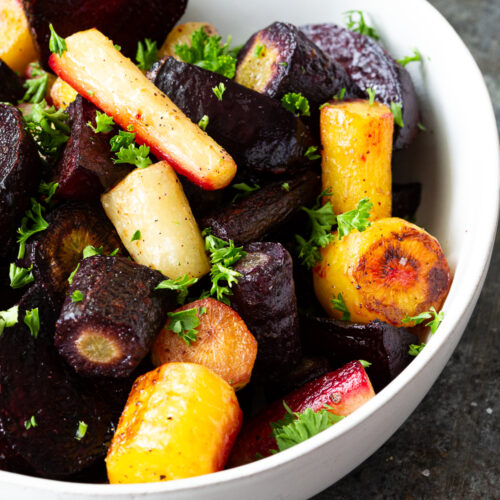 Roasted beets and carrots, with natural sweetness and caramelization, for the ultimate side dish.