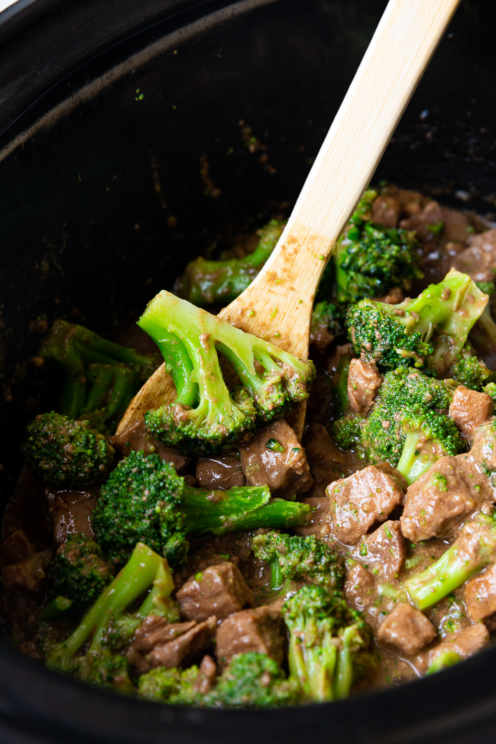 Slow cooker beef and broccoli offers tender beef and a rich savory sauce. 