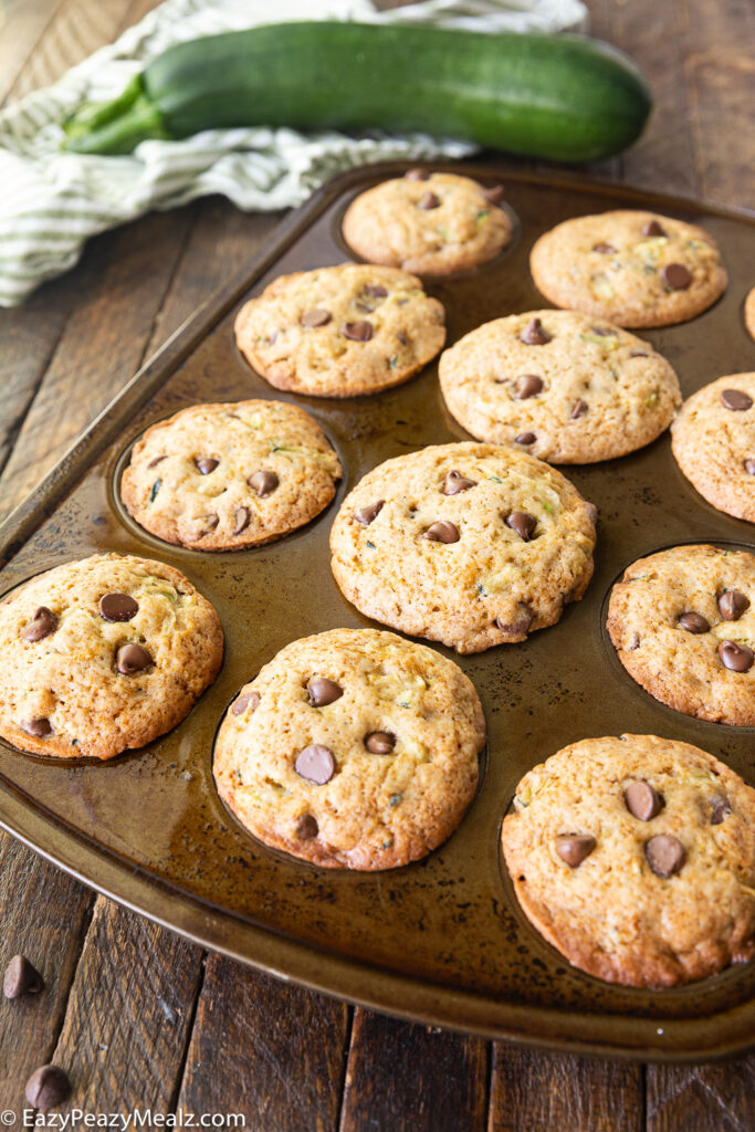 a tray of chocolate chip zucchini muffins