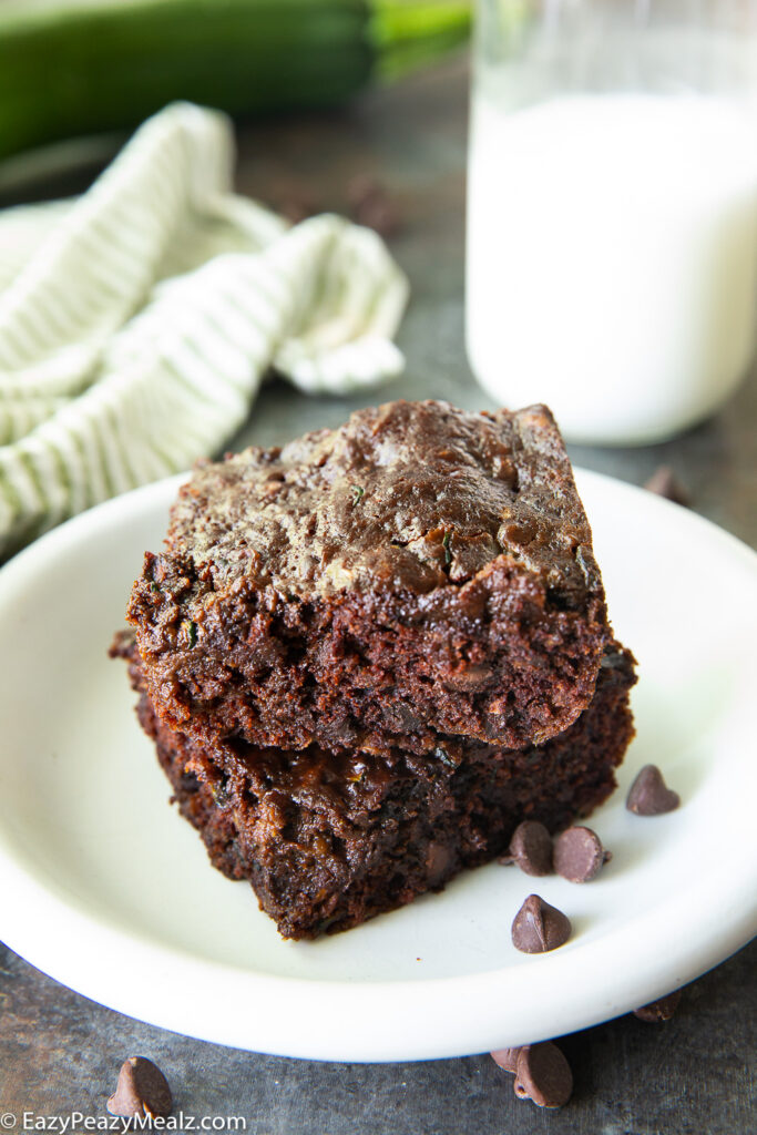 A plate with brownies on it, zucchini brownies