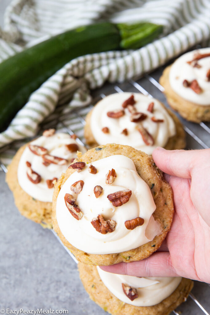 Zucchini cookies with cream cheese frosting and pecan pieces. 