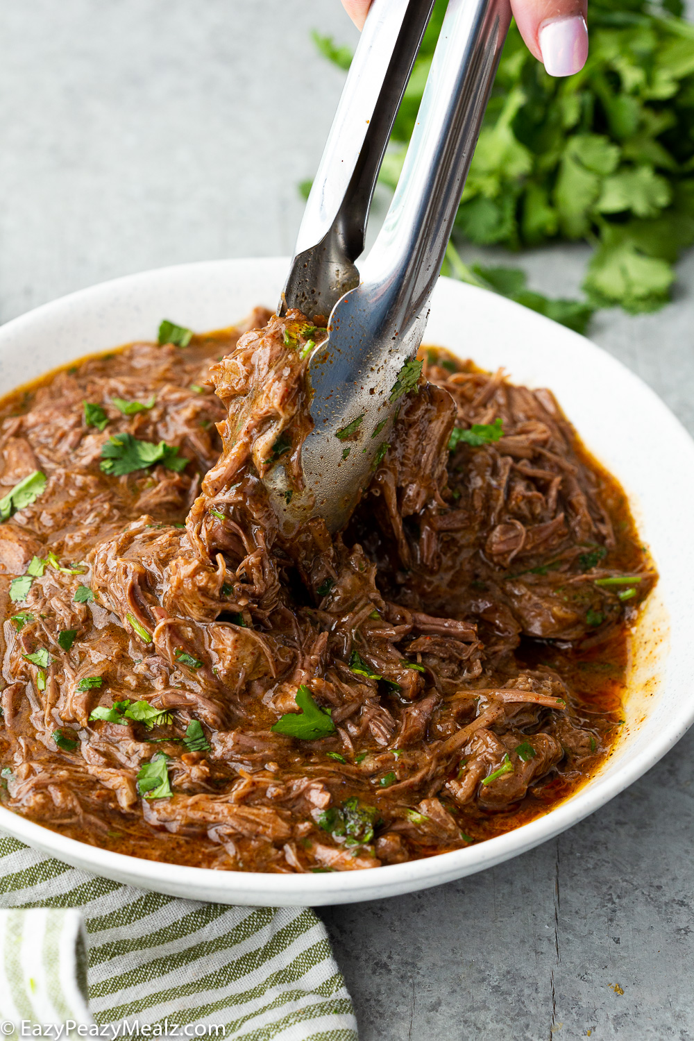 Instant pot shredded beef, a flavorful shredded beef that is easy to use in tacos, burritos, and more. 